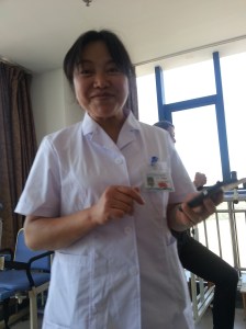 Shenjie ... This picture was very hard to take because she always refused to take a picture. Most of the women in the hospital do not like to have their picture taken because they always tell me they did not have their makeup on, their hair was not pretty that day or had a bad "looking day." Women! :-)